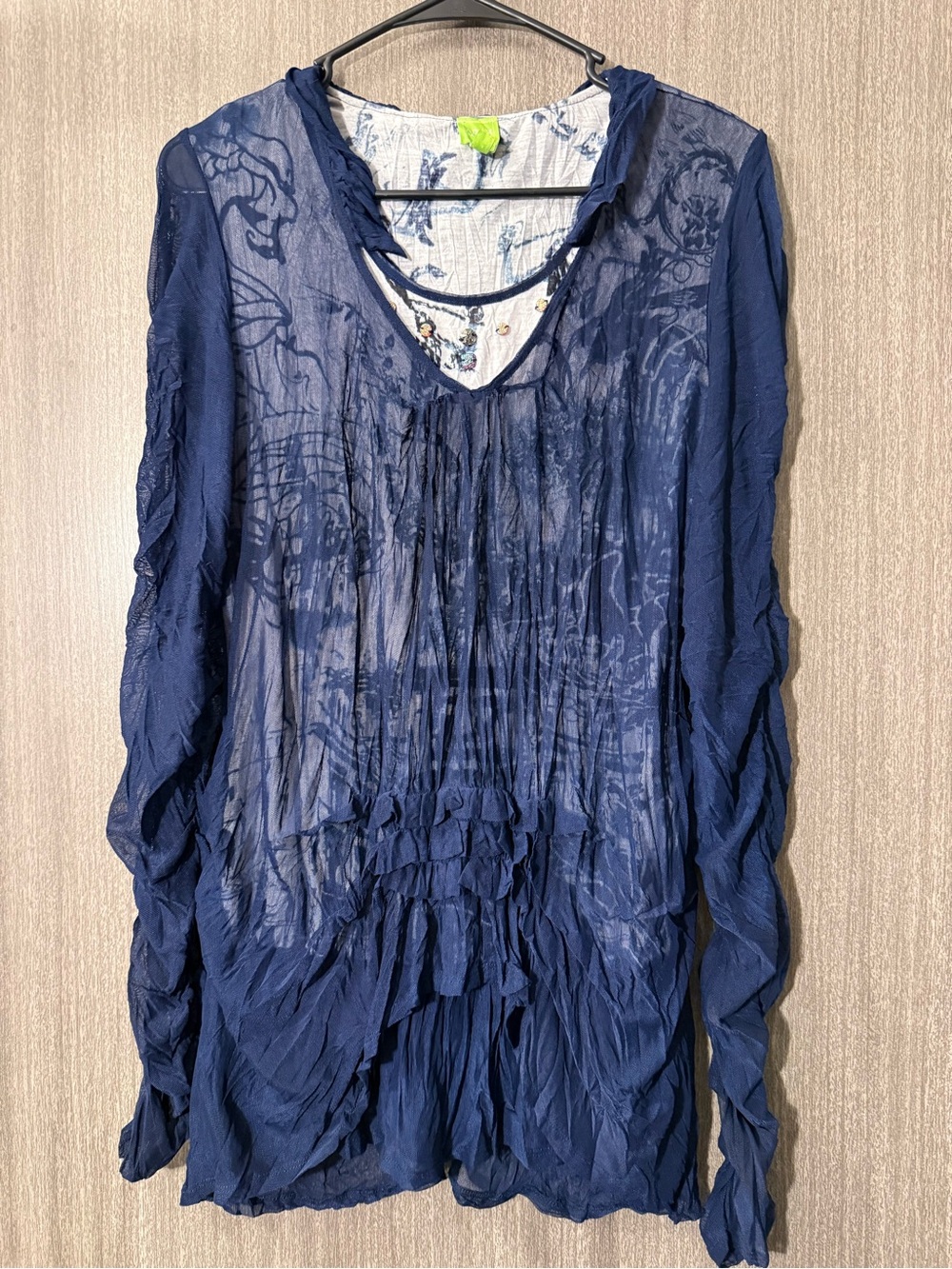 Adam Jacobs Neon Lime Label on Tie-Dye Blue Garment